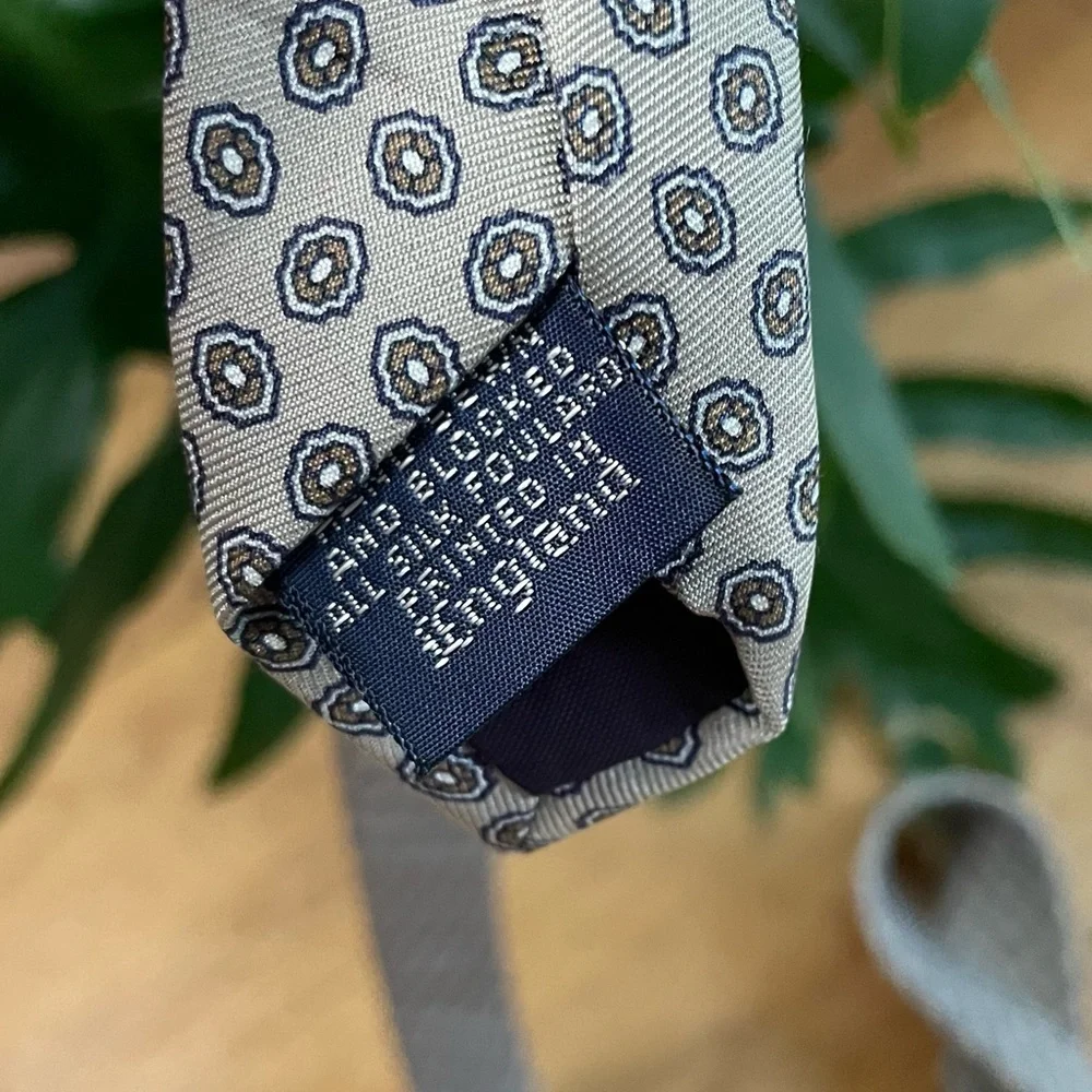 Kenneth Gordon Strickland’s Tan Silk Men’s Tie